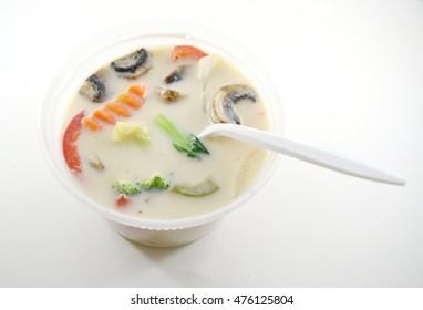 Thai Tom Kha Gai (chicken Coconut Soup) In Plastic Takeout Container With Spoon - Isolated