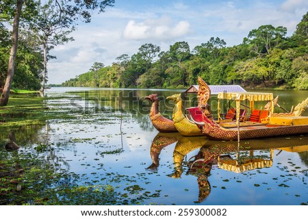 Thai traditional  boats on the lake near,Bayon temple in Angkor Thom, Siemreap, Cambodia.