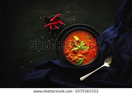 Thai traditional food, Red curry, spicy soup, dark food photography