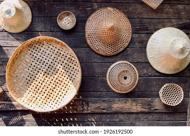 Thai traditional handicrafts of Bamboo hang on wooden wall. Concept of Thailand traditional handicrafts