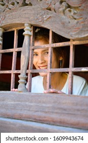 Thai Woman At Clerestory, Chiang Mai.