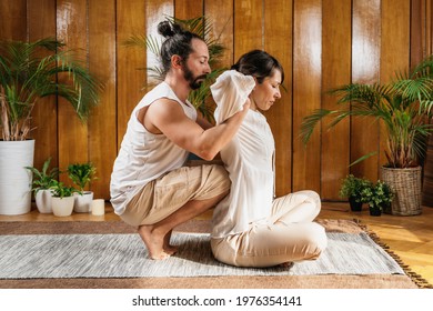 Thai Yoga Massage - Upper Body Stretch At Wellness Center. Alternative Therapy Concept