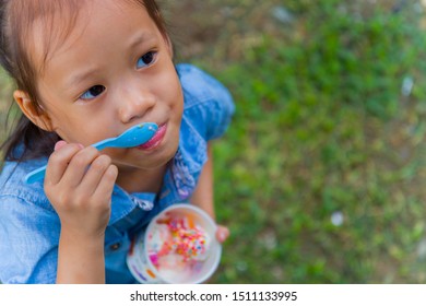 243 Girl eating ice candy bar Images, Stock Photos & Vectors | Shutterstock