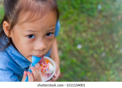 243 Girl eating ice candy bar Images, Stock Photos & Vectors | Shutterstock