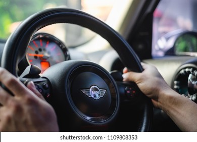 Thailand :10 May 2018, Close Up Man Driving Mini Cooper Car On The Road.