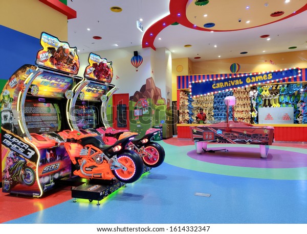 Thailand, 2020. Game zone for playing games in a\
shopping mall. These games are very popular with kids of all ages\
and parents too.