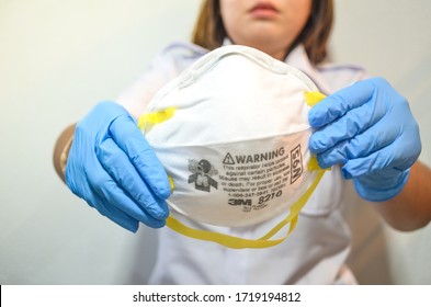 THAILAND, 29 APRIL 2020 - Nurse With Blue Nitride Gloves Holding 3M N95 Respirator Face Mask. 