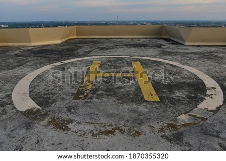 Helipad​ sunset​ in​ the​ building​ at​ Phitsanulok​ Thailand.