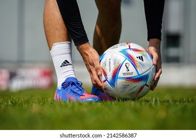 Thailand - April 2022 : Adidas launch the official match ball for Qatar FIFA World Cup 2022 as name "AL RIHLA" which is mean "Journey" in English. Close-up and selective focus at the object.