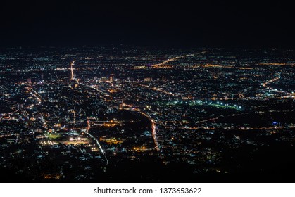 Thailand, Chiang Mai - Wat Phra That Doi Suthep - Top night view of the city from the top  of the mountain