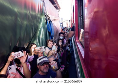 Thailand, Chumphon - January 27, 2020: Tourists Take Unusual Train Pictures On A Smartphone. They Want To Fix The Exoticism Of Life