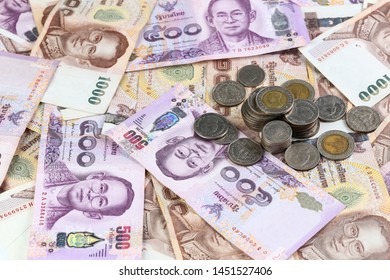 Thailand currency and coins background.