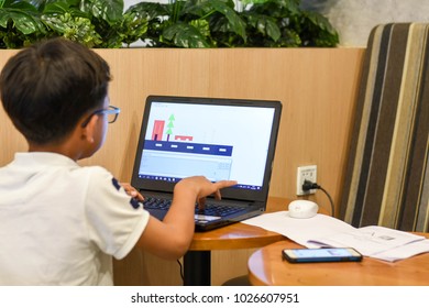 Thailand, February 2018. Phil The Young Asian Boy Is Coding His MSWLogo Language To Build Up His Pictures In The Coding For Kids Classroom In Bangkok Thailand.