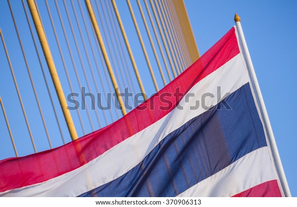 Thailand flag and yellow\
cable.