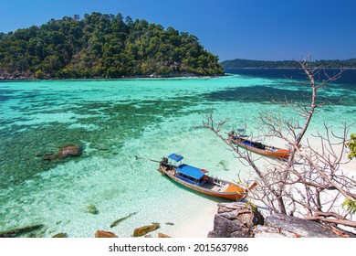 Thailand island Koh Lipe turquoise sea color with coral reef view point and travel boat with clear blue sky background landscape