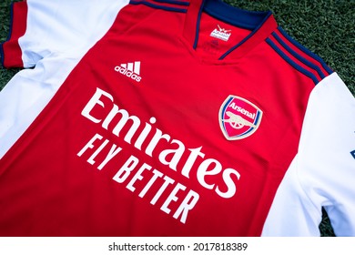 Thailand - July 2021 : Adidas present the new Arsenal team home jersey season 2021-2022. Sport equipment object, close-up and selective focus.