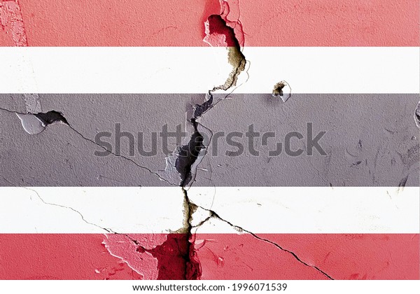 Thailand national flag icon\
grunge pattern painted on old weathered broken wall background,\
abstract Thailand politics economy society issues concept texture\
wallpaper