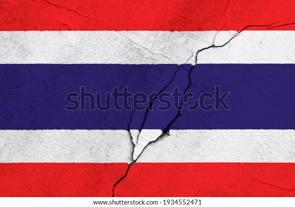 Thailand national flag icon pattern on\
broken weathered cracked concrete wall, abstract thailand politics\
economy society conflicts concept texture\
wallpaper