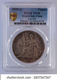 Thailand - October, 21, 2020: A Coins. 1 Piastre - French Indo-China 1910 Obverse: Madam Liberty, silver coin graded by PCGS in a protective case with barcode.