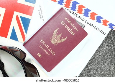 Thailand passport and document plastic bag represent the tourism and travel industry concept related idea. In the scene appear the chinese text on a piece of paper meaning of for official use only.