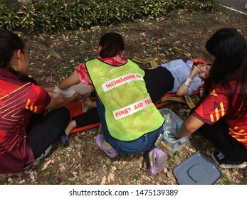 Thailand, Pathumthani, Thammasat University, 6 August 2019: Demonstration Of First Aid While Fire Drill