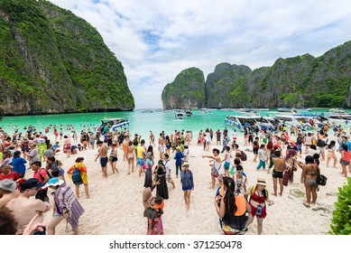 THAILAND, PHI PHI ISLAND, 28.OCTOBER 2015.Tourists enjoying on the white sand Maya Bay beach and turquoise water of lagoon