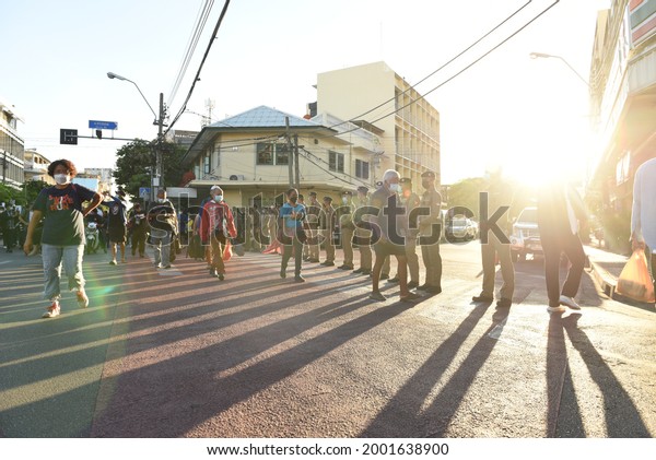Thailand -\
Police stand to maintain order  As pro-democracy protesters walk to\
the The Government House Thailand, to call on Prime Minister Prayut\
Chan-o-cha to resign on July 3,\
2021.
