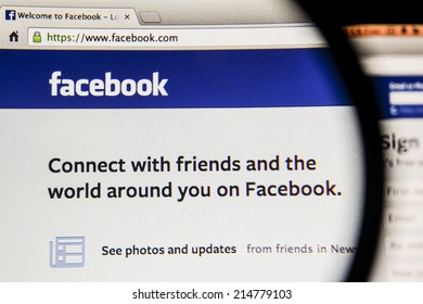 THAILAND - SEPTEMBER 2, 2014: Magnifying Glass Of Facebook Page View On Web Browser.