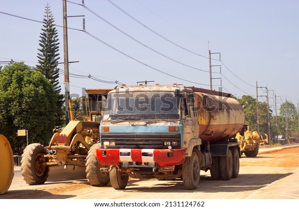 Thailand, Surat\
Thani - January 29, 2020: Road construction. Road works and road\
equipment. Road scraper\
operation