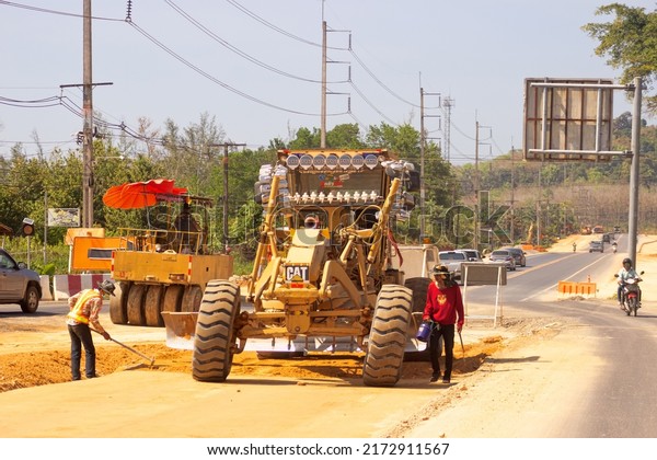 Thailand, Surat\
Thani - January 29, 2020: Road construction. Road works and road\
equipment. Road scraper\
operation