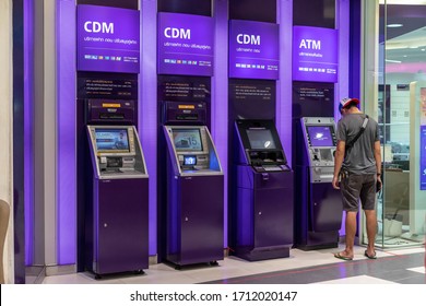 Thailand,April 23,2020;Customer use Aotomatic teller machine(ATM)of Siam commercial bank Thailand for withdraw cash,pay services and other financial operations.ATM/CDM machines kiosk in shopping mall.