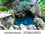 Tham Chang Jang cave with water source and river in Vang Vieng Vientiane Province Laos in Southeastasia Asia.