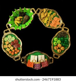 Thamboolam plates for functions. Trays having sweets, fruits, dresses as part of  tradition for all Hindu festivals and occasions like marriages in Tamilnadu, India. Top view.
