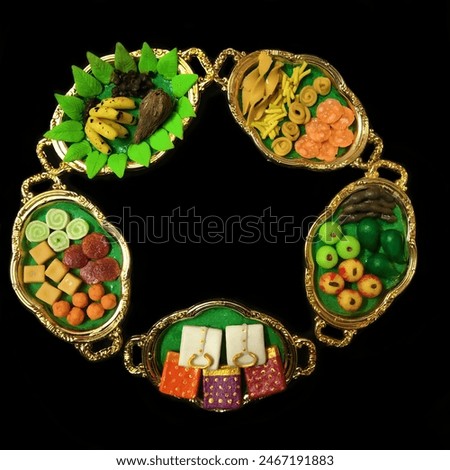 Thamboolam plates for functions. Trays having sweets, fruits, dresses as part of  tradition for all Hindu festivals and occasions like marriages in Tamilnadu, India. Top view.