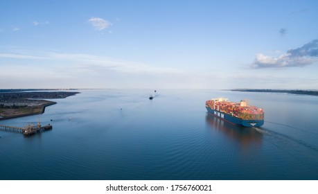 Thames Estuary, Essex, United Kingdom - June 15 2020: The BIGGEST container ship in the world, the HMM Algeciras leaving the DP World Gateway Port passing Canvey Island, Essex, United Kingdom