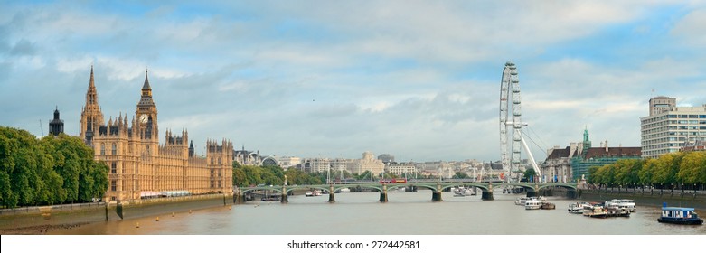 Thames River panorama with London Eye and Westminster Palace in London.