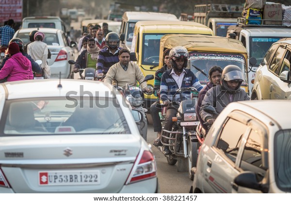 THANJAVUR, INDIA - FEBRUARY 03: Indian riders ride\
motorbikes on busy road on February 03, 2012 in Thanjavur, India.\
Motorbike is the most favorite vehicle and most affordable for\
India.