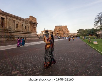 Thanjavur, Tamil Nadu, India - January 2017: An Indian Woman Taking A Picture Of The Ancient Chola Era Hindu Temple Of Brihadeeswarar.