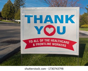 Thank You To All The Healthcare And Frontline Workers Sign At Front Lawn During Corona Virus Pandemic Outbreak. Selective Focus. Emergency Workers, First Responders, Health Care Workers Appreciation.