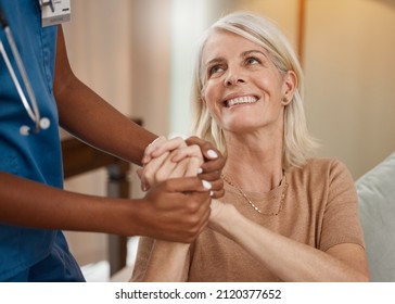 Thank you for all that you do. Shot of a doctor having a consultation with a senior woman at home.