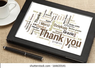 Thank You In Different Languages - Word Cloud On A  Digital Tablet