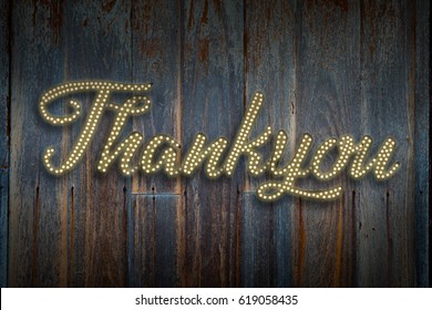 Thank you Light bulb style or Disco style on old wood planks background - Powered by Shutterstock