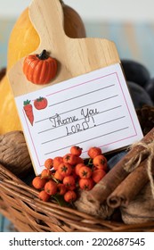 Thank You, LORD, Handwritten Message On A Note Placed In A Wicker Basket With Autumn Fruit. A Close-up. Gratitude And Praise To God, Christian Thanksgiving Day Concept. Vertical Shot.