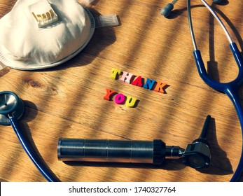 Thank You Message With Face Mask, Stethoscope And Otoscope