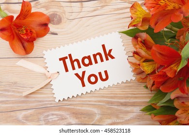 Thank You Message, Some lilies on weathered wood with Thank You Card and copy space for your message
