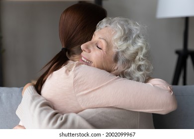 Thank You My Dear. Grateful Elderly Grandmother Pensioner Hold In Arms Adult Daughter Grandkid Feel Thankful For Care Glad To Meet Reconcile. Aged Female Hug Young Woman Caretaker Appreciate For Help