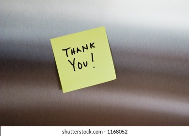 A Thank You Post It Note On A Stainless Fridge