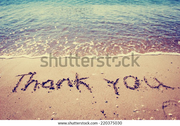 Thank You Words Written On Sand Stock Photo (Edit Now) 220375030