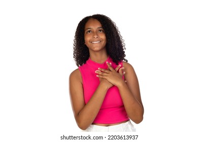 Thankful Smiling Black Woman Holding Hands Near Heart On Chest Isolated On A White Background