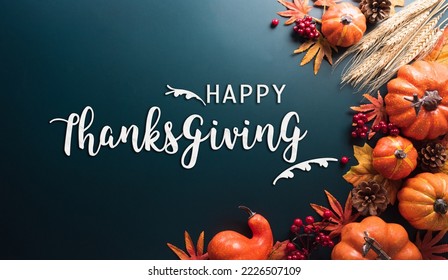 Thanksgiving and Autumn decoration concept made from autumn leaves and pumpkin on dark background. Flat lay, top view with copy space. - Shutterstock ID 2226507109
